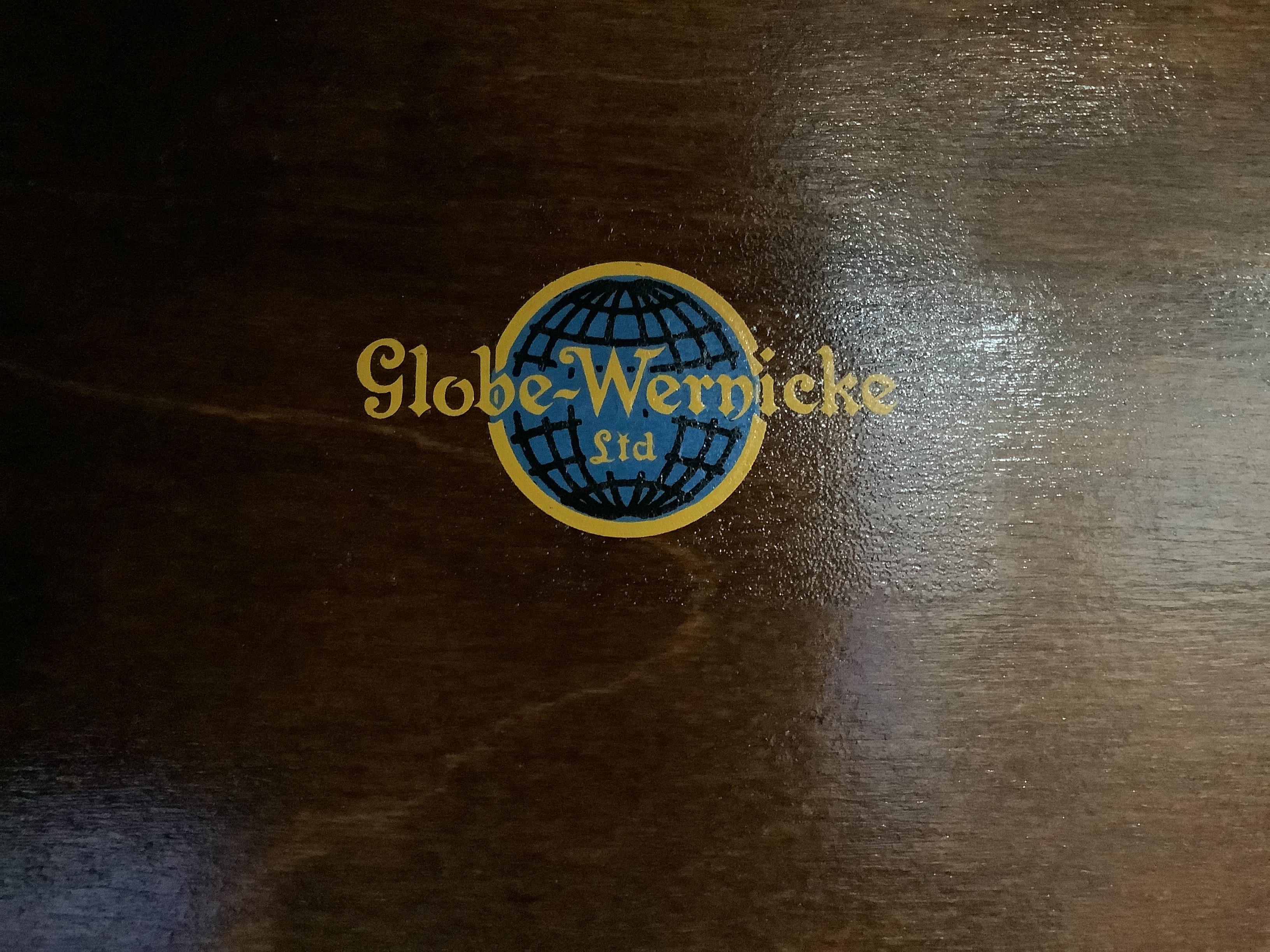 A pair of Globe Wernicke oak three section bookcases, width 85cm, depth 28cm, height 109cm